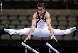 Picture of male gymnast on the parallel bars